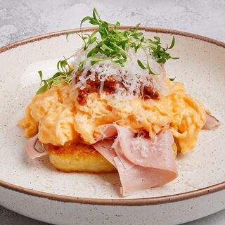 Hash Brown & Scrambled Eggs with Muhammara, plated